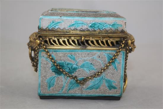 A Chinese glazed biscuit porcelain and gilt metal mounted incense burner and cover, 19th century, 10.5cm, base drilled